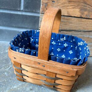 Petite Longaberger basket with handle and fabric insert